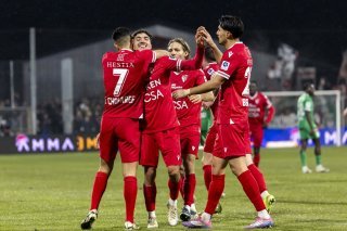 Theo Bouchlarhem (SIO), 2nd left, celebrates his goal with his teammates Ilyas Chouaref (SIO) #7, Numa Lavanchy (SIO), 2nd right, and Theo Berdayes (SIO), right, after scoring the 0:1, during the Super League soccer match of Swiss Championship between Yverdon Sport FC, YS, and FC Sion, SIO, at the Stade Municipal, Yverdon-Les-Bains in Yverdon-Les-Bains, Switzerland, Saturday, December 14, 2024. (KEYSTONE/Salvatore Di Nolfi)